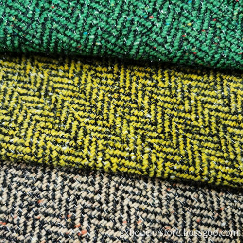 Woolen boucle herringbone with lurex fabric